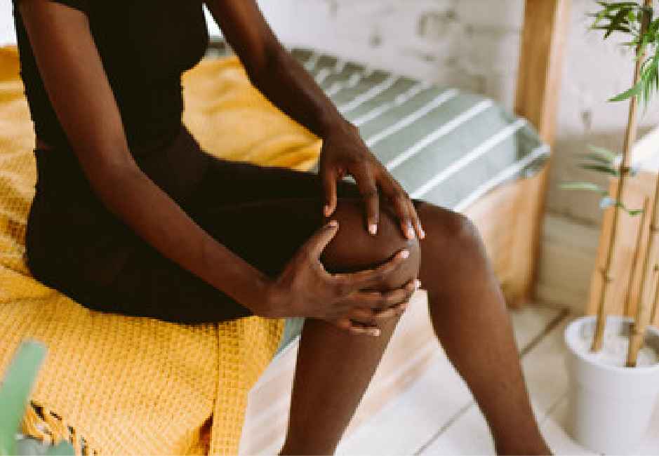 Women massaging knee